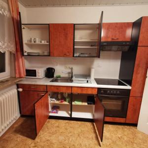 Η κουζίνα ή μικρή κουζίνα στο Simple Standard 3 Zimmer Apartment - zentral