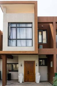 a house with a window and a door at Urban oasis in kingsland city in Lusaka