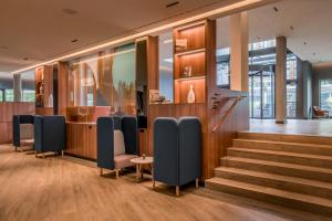Uma área de estar em Geneva Marriott Hotel