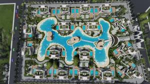 an aerial view of a resort with a swimming pool at club arona by laren hotels in Serik