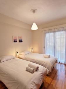 Ένα ή περισσότερα κρεβάτια σε δωμάτιο στο Antonella's Home