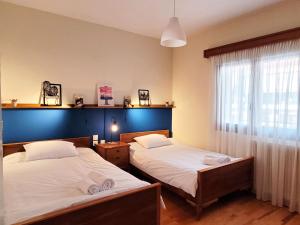 Ένα ή περισσότερα κρεβάτια σε δωμάτιο στο Antonella's Home