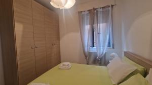 Кровать или кровати в номере WH - Bussana