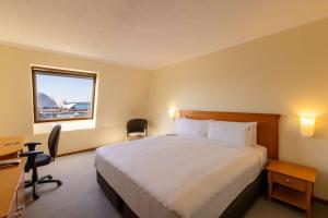 Sydney Harbour Hotelにあるベッド