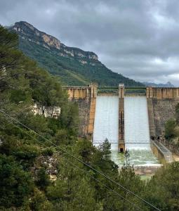 a dam on a river with water at Moli l'Abad in Puebla de Benifasar