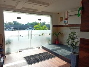 Posezení v ubytování Hotel Palms Residency, Chembur Mumbai