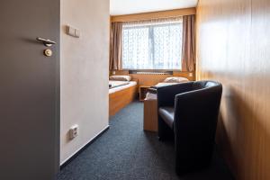 Hotel a ubytovna Zimní stadion Slaný的休息区