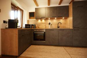 Kuchyň nebo kuchyňský kout v ubytování Ferienwohnung Alpseeliebe