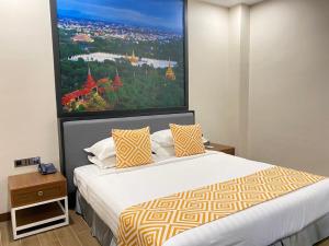 Postel nebo postele na pokoji v ubytování Holiday Pier Hotel