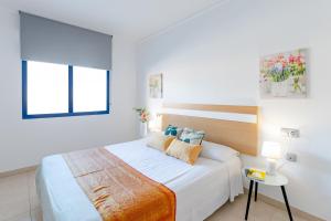 Posteľ alebo postele v izbe v ubytovaní Alicante Hills Premium