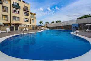 Bazén v ubytování Tropical Views by Sunkeyrents nebo v jeho okolí