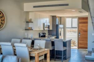 Η κουζίνα ή μικρή κουζίνα στο Eagle Village at Islas del Mar A2 +8 φωτογραφίες