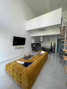 Agreable Duplex tout confort. tesisinde bir oturma alanı