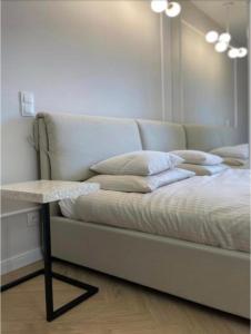 Posteľ alebo postele v izbe v ubytovaní Prestige Apart Gdańsk