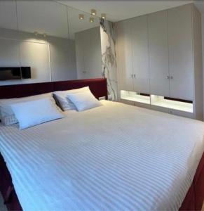 Posteľ alebo postele v izbe v ubytovaní Prestige Apart Gdańsk