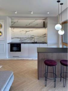 Kuchyňa alebo kuchynka v ubytovaní Prestige Apart Gdańsk