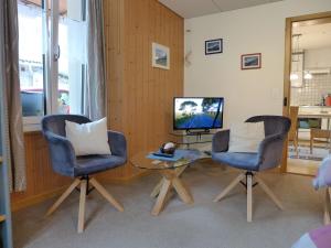 TV a/nebo společenská místnost v ubytování Apartment Rösli by Interhome + 15 fotografií