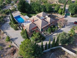 an aerial view of a house with a swimming pool at Holiday Home Montinho by Interhome in Loulé