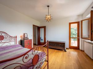 Posteľ alebo postele v izbe v ubytovaní Holiday Home Pinetina by Interhome