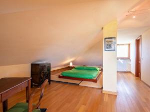 Posteľ alebo postele v izbe v ubytovaní Holiday Home Pinetina by Interhome