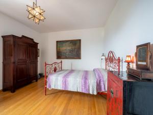 Posteľ alebo postele v izbe v ubytovaní Holiday Home Pinetina by Interhome