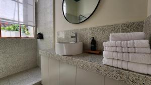 Koupelna v ubytování Casa Par Grand Suites + 27 fotografií