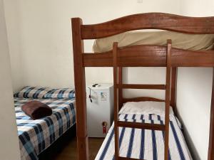 Voodi või voodid majutusasutuse Pousada Pitanga toas