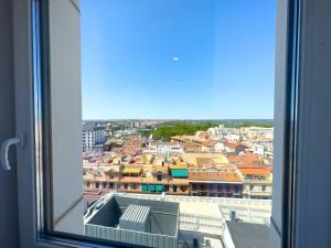 a view of a city from a window at Plaza España Superb Views in Madrid