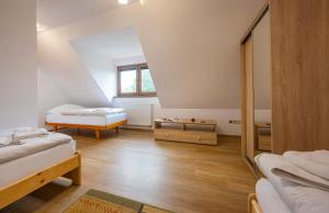Guest House Mengsdorf客房内的一张或多张床位