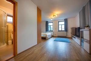 Guest House Mengsdorf客房内的一张或多张床位