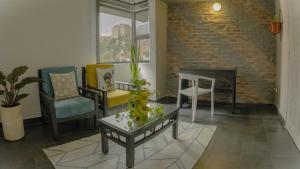 Χώρος καθιστικού στο Hotel El Peñon by Bithotels