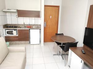 Η κουζίνα ή μικρή κουζίνα στο Privé Boulevard Suites Viaje Bem