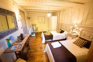 Łóżko lub łóżka w pokoju w obiekcie Cas do Mestre Casa rural con Encanto