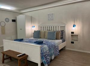 מיטה או מיטות בחדר ב-La Iolanda