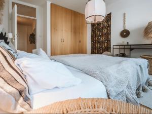 Łóżko lub łóżka w pokoju w obiekcie Apartment Tauernspirit by Interhome