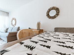 Łóżko lub łóżka w pokoju w obiekcie Apartment Tauernspirit by Interhome