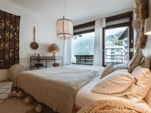 Łóżko lub łóżka w pokoju w obiekcie Apartment Tauernspirit by Interhome