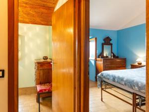 Postel nebo postele na pokoji v ubytování Holiday Home Munt del Nana by Interhome