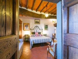 a bedroom with a bed in a room at Holiday Home Ridaldi by Interhome in Greve in Chianti