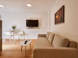 TV a/nebo společenská místnost v ubytování Studio Máj-2 by Interhome