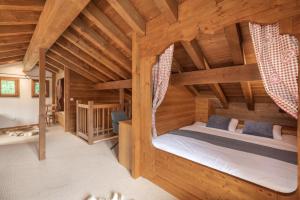 Voodi või voodid majutusasutuse Chalet Papin toas