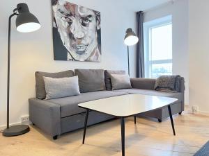 Posezení v ubytování Cozy New Apartment In Popular Area In Alliancevej 8a 2