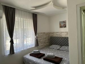 Postel nebo postele na pokoji v ubytování Hostel Gray