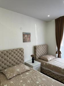 Postel nebo postele na pokoji v ubytování Hostel Gray