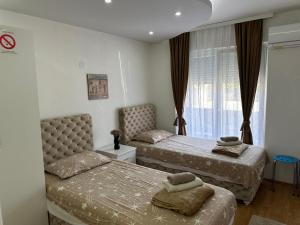 Postel nebo postele na pokoji v ubytování Hostel Gray