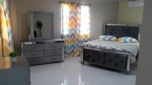 Postel nebo postele na pokoji v ubytování Haciendas Rivera