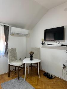 TV a/nebo společenská místnost v ubytování Hostel Gray