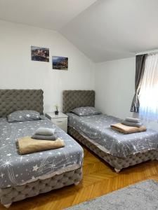 Postel nebo postele na pokoji v ubytování Hostel Gray