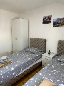 Postel nebo postele na pokoji v ubytování Hostel Gray