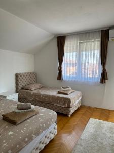 Postel nebo postele na pokoji v ubytování Hostel Gray